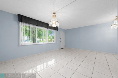 Paradise awaits! Bright and beautiful first floor unit with on Flamingo Lakes Country Club in Florida - for sale on GolfHomes.com, golf home, golf lot
