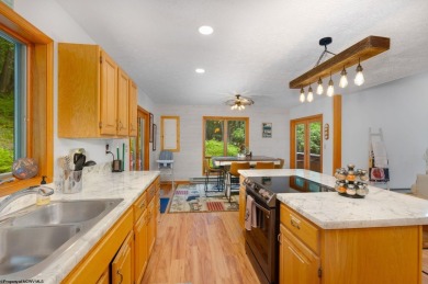Welcome to 'Misty Mountain Chalet' an established rental home on Alpine Lake Resort in West Virginia - for sale on GolfHomes.com, golf home, golf lot