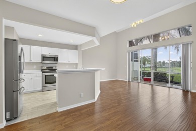 Vacant and move-in ready! This beautifully maintained Golf on BallenIsles Golf and Country Club in Florida - for sale on GolfHomes.com, golf home, golf lot