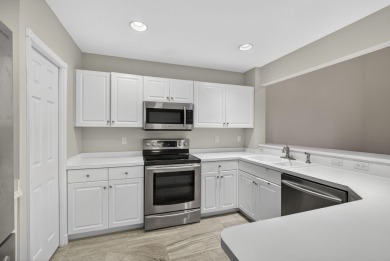 Vacant and move-in ready! This beautifully maintained Golf on BallenIsles Golf and Country Club in Florida - for sale on GolfHomes.com, golf home, golf lot