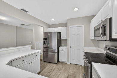 Vacant and move-in ready! This beautifully maintained Golf on BallenIsles Golf and Country Club in Florida - for sale on GolfHomes.com, golf home, golf lot