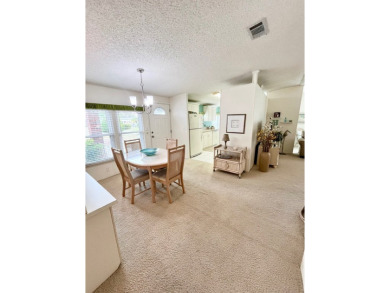 Welcome to this beautifully cared-for home in the gated golf on Pine Lakes Country Club in Florida - for sale on GolfHomes.com, golf home, golf lot
