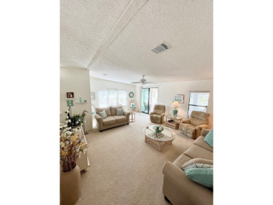 Welcome to this beautifully cared-for home in the gated golf on Pine Lakes Country Club in Florida - for sale on GolfHomes.com, golf home, golf lot