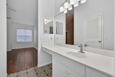 Vacant and move-in ready! This beautifully maintained Golf on BallenIsles Golf and Country Club in Florida - for sale on GolfHomes.com, golf home, golf lot