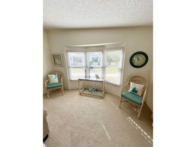 Welcome to this beautifully cared-for home in the gated golf on Pine Lakes Country Club in Florida - for sale on GolfHomes.com, golf home, golf lot