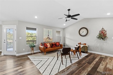 This must-see 3-bedroom, 2-full bath residence is situated on on Raintree Country Club in Missouri - for sale on GolfHomes.com, golf home, golf lot