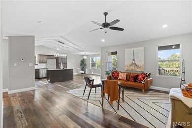 This must-see 3-bedroom, 2-full bath residence is situated on on Raintree Country Club in Missouri - for sale on GolfHomes.com, golf home, golf lot