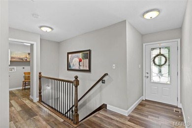 This must-see 3-bedroom, 2-full bath residence is situated on on Raintree Country Club in Missouri - for sale on GolfHomes.com, golf home, golf lot