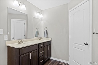 This must-see 3-bedroom, 2-full bath residence is situated on on Raintree Country Club in Missouri - for sale on GolfHomes.com, golf home, golf lot