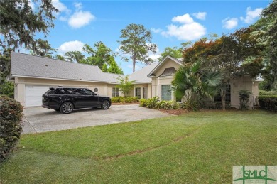 Large garage with full bonus above garage and full bath. Brick on The Landings Club - Palmetto in Georgia - for sale on GolfHomes.com, golf home, golf lot