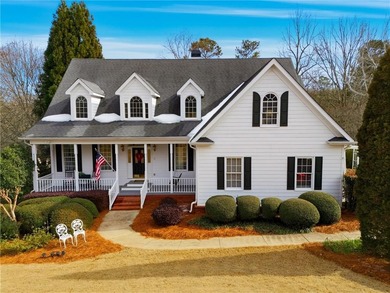 Welcome home to this charming Southern Living style home tucked on The Providence Club in Georgia - for sale on GolfHomes.com, golf home, golf lot