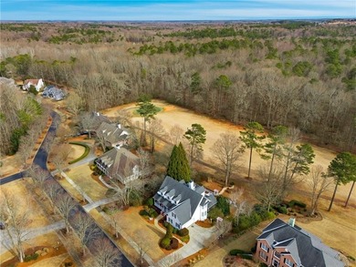 Welcome home to this charming Southern Living style home tucked on The Providence Club in Georgia - for sale on GolfHomes.com, golf home, golf lot