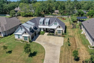 Welcome to an exquisite 2-story home nestled in the serene and on Hide-A-Way Lake Golf Course in Texas - for sale on GolfHomes.com, golf home, golf lot