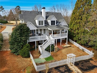 Welcome home to this charming Southern Living style home tucked on The Providence Club in Georgia - for sale on GolfHomes.com, golf home, golf lot