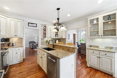 Welcome home to this charming Southern Living style home tucked on The Providence Club in Georgia - for sale on GolfHomes.com, golf home, golf lot