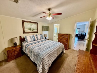 Home is located in Water Oak Country Club Estates in Lady Lake on Water Oak Country Club Estates in Florida - for sale on GolfHomes.com, golf home, golf lot