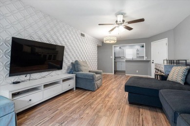 Located in the heart of Palm Beach Gardens, this charming on BallenIsles Golf and Country Club in Florida - for sale on GolfHomes.com, golf home, golf lot