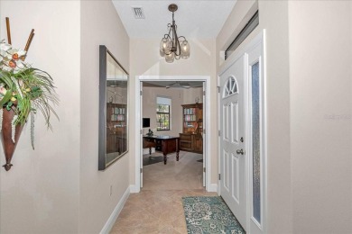 This thoughtfully expanded Jacaranda model offers 4 bedrooms, 3 on Summerglen Country Club in Florida - for sale on GolfHomes.com, golf home, golf lot