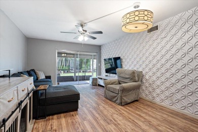 Located in the heart of Palm Beach Gardens, this charming on BallenIsles Golf and Country Club in Florida - for sale on GolfHomes.com, golf home, golf lot