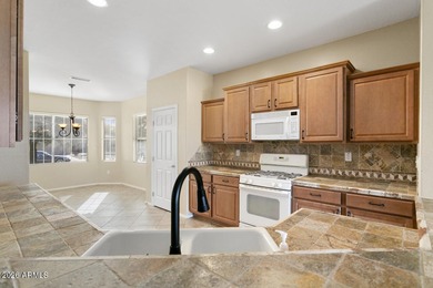 Nestled on a spacious .24-acre corner lot in the desirable on Cimarron Golf Club in Arizona - for sale on GolfHomes.com, golf home, golf lot