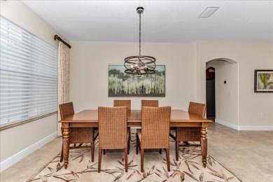 This thoughtfully expanded Jacaranda model offers 4 bedrooms, 3 on Summerglen Country Club in Florida - for sale on GolfHomes.com, golf home, golf lot