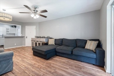 Located in the heart of Palm Beach Gardens, this charming on BallenIsles Golf and Country Club in Florida - for sale on GolfHomes.com, golf home, golf lot