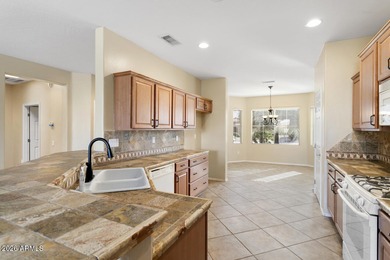 Nestled on a spacious .24-acre corner lot in the desirable on Cimarron Golf Club in Arizona - for sale on GolfHomes.com, golf home, golf lot