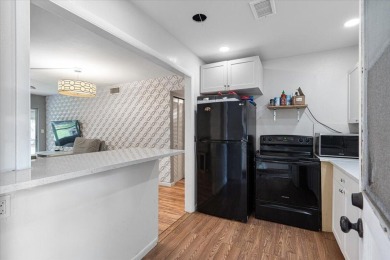 Located in the heart of Palm Beach Gardens, this charming on BallenIsles Golf and Country Club in Florida - for sale on GolfHomes.com, golf home, golf lot