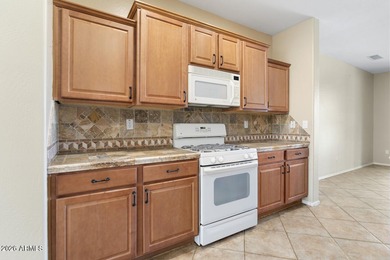 Nestled on a spacious .24-acre corner lot in the desirable on Cimarron Golf Club in Arizona - for sale on GolfHomes.com, golf home, golf lot