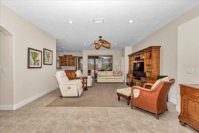 This thoughtfully expanded Jacaranda model offers 4 bedrooms, 3 on Summerglen Country Club in Florida - for sale on GolfHomes.com, golf home, golf lot