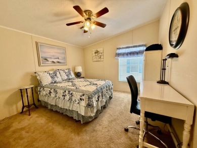 Home is located in Water Oak Country Club Estates in Lady Lake on Water Oak Country Club Estates in Florida - for sale on GolfHomes.com, golf home, golf lot