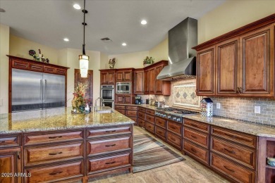 Experience luxury in this netzero, solar-powered on Superstition Mountain Club - Lost Gold in Arizona - for sale on GolfHomes.com, golf home, golf lot