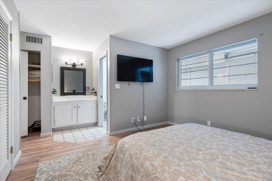 Located in the heart of Palm Beach Gardens, this charming on BallenIsles Golf and Country Club in Florida - for sale on GolfHomes.com, golf home, golf lot