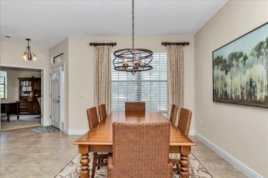 This thoughtfully expanded Jacaranda model offers 4 bedrooms, 3 on Summerglen Country Club in Florida - for sale on GolfHomes.com, golf home, golf lot