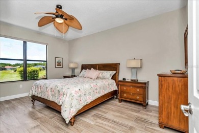 This thoughtfully expanded Jacaranda model offers 4 bedrooms, 3 on Summerglen Country Club in Florida - for sale on GolfHomes.com, golf home, golf lot