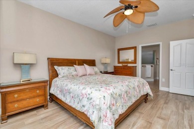 This thoughtfully expanded Jacaranda model offers 4 bedrooms, 3 on Summerglen Country Club in Florida - for sale on GolfHomes.com, golf home, golf lot