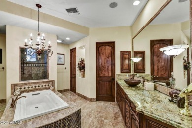 Experience luxury in this netzero, solar-powered on Superstition Mountain Club - Lost Gold in Arizona - for sale on GolfHomes.com, golf home, golf lot