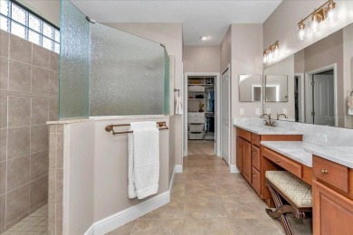 This thoughtfully expanded Jacaranda model offers 4 bedrooms, 3 on Summerglen Country Club in Florida - for sale on GolfHomes.com, golf home, golf lot