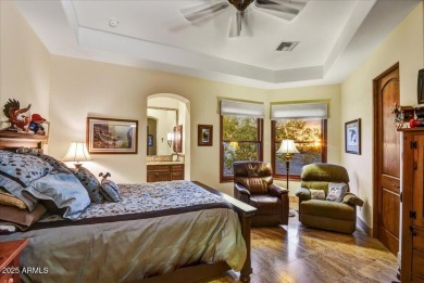 Experience luxury in this netzero, solar-powered on Superstition Mountain Club - Lost Gold in Arizona - for sale on GolfHomes.com, golf home, golf lot