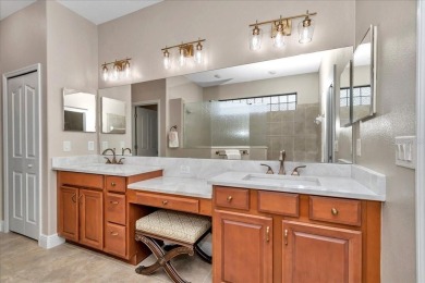 This thoughtfully expanded Jacaranda model offers 4 bedrooms, 3 on Summerglen Country Club in Florida - for sale on GolfHomes.com, golf home, golf lot