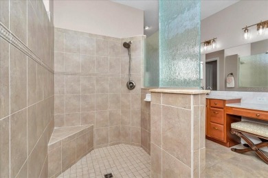 This thoughtfully expanded Jacaranda model offers 4 bedrooms, 3 on Summerglen Country Club in Florida - for sale on GolfHomes.com, golf home, golf lot