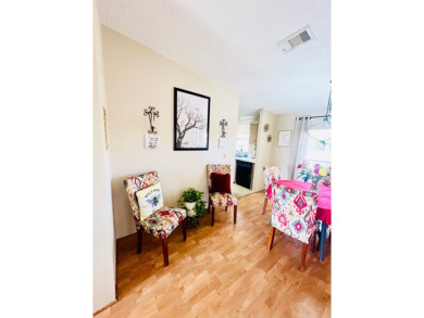 This charming two-bedroom, two-bathroom home is nestled in a on Pine Lakes Country Club in Florida - for sale on GolfHomes.com, golf home, golf lot