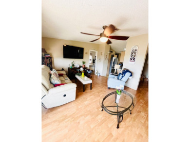This charming two-bedroom, two-bathroom home is nestled in a on Pine Lakes Country Club in Florida - for sale on GolfHomes.com, golf home, golf lot