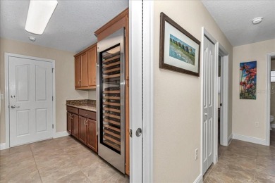 This thoughtfully expanded Jacaranda model offers 4 bedrooms, 3 on Summerglen Country Club in Florida - for sale on GolfHomes.com, golf home, golf lot