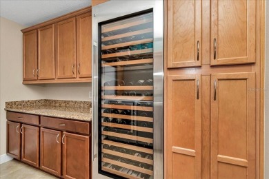 This thoughtfully expanded Jacaranda model offers 4 bedrooms, 3 on Summerglen Country Club in Florida - for sale on GolfHomes.com, golf home, golf lot