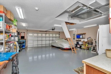 This thoughtfully expanded Jacaranda model offers 4 bedrooms, 3 on Summerglen Country Club in Florida - for sale on GolfHomes.com, golf home, golf lot