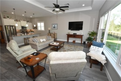 Price Reduced! Welcome to Magnolia Golf Villas, where residents on Sun n Lake Golf and Country Club in Florida - for sale on GolfHomes.com, golf home, golf lot