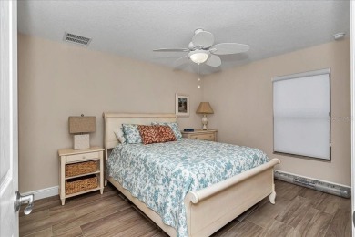 This thoughtfully expanded Jacaranda model offers 4 bedrooms, 3 on Summerglen Country Club in Florida - for sale on GolfHomes.com, golf home, golf lot