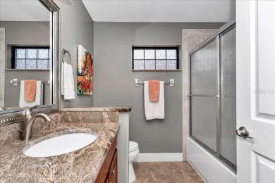 This thoughtfully expanded Jacaranda model offers 4 bedrooms, 3 on Summerglen Country Club in Florida - for sale on GolfHomes.com, golf home, golf lot