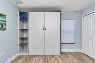 This thoughtfully expanded Jacaranda model offers 4 bedrooms, 3 on Summerglen Country Club in Florida - for sale on GolfHomes.com, golf home, golf lot